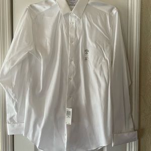 Brand new Never Worn White Calvin Klein Dress Shirt neck 16.5 sleeve 34/35